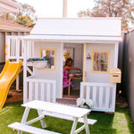 The Club House Cubby With A Slide - in grey - child playing inside