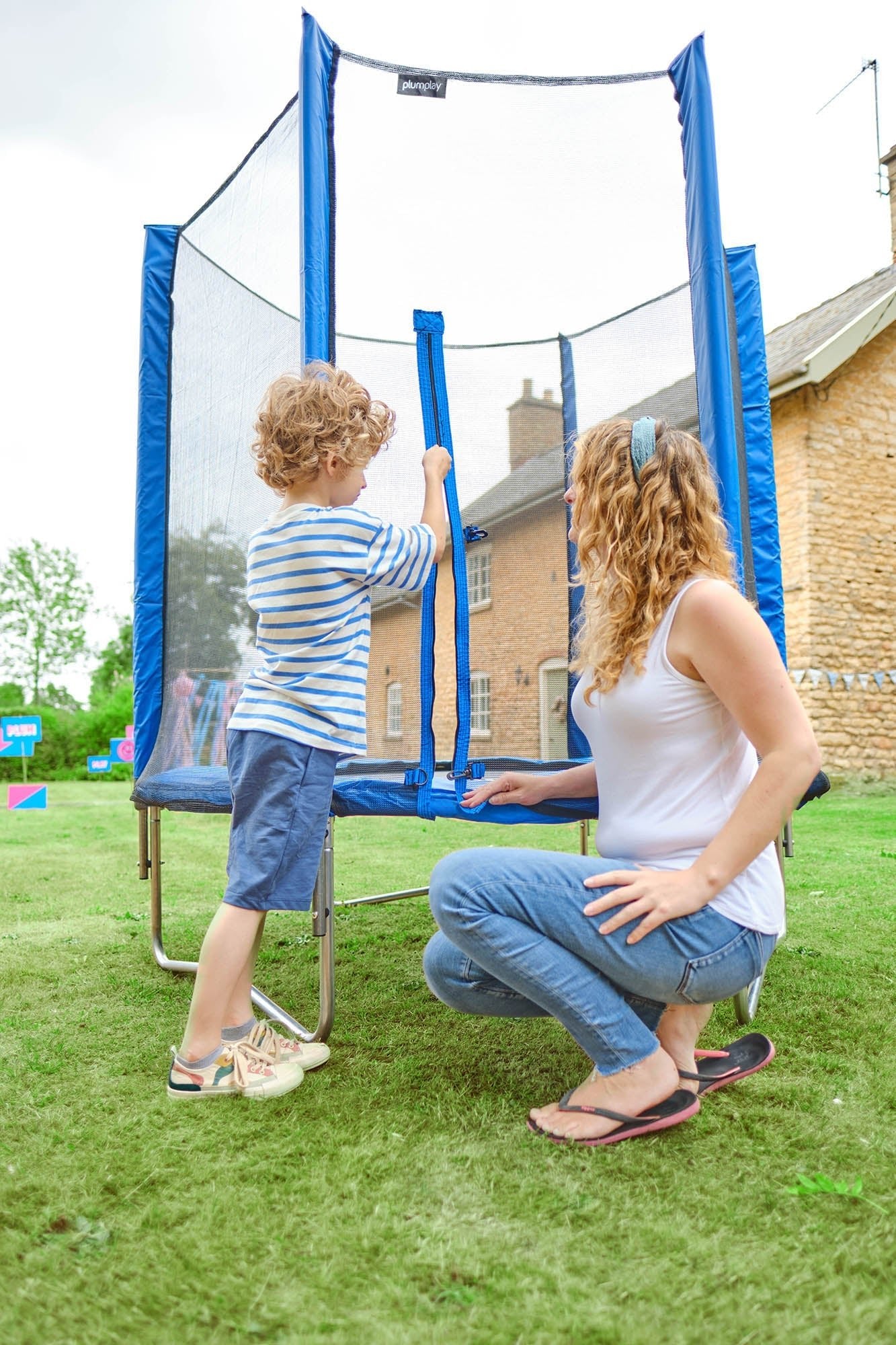 Plum 7ft Junior Jumper Trampoline with Springsafe® Enclosure - Pink & Blue  – Ages 3–7